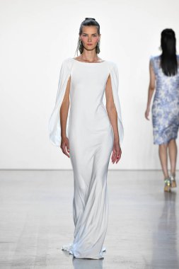 NEW YORK, NEW YORK - SEPTEMBER 05: A model walks the runway for Tadashi Shoji Spring/Summer 2020 during New York Fashion Week: The Shows at Gallery I at Spring Studios on September 05, 2019 in New York City. 