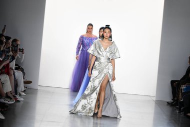 NEW YORK, NEW YORK - SEPTEMBER 05: Models walk the runway finale for Tadashi Shoji Spring/Summer 2020 during New York Fashion Week: The Shows at Gallery I at Spring Studios on September 05, 2019 in New York City. 