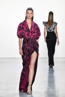NEW YORK, NEW YORK - SEPTEMBER 05: A model walks the runway for Tadashi Shoji Spring/Summer 2020 during New York Fashion Week: The Shows at Gallery I at Spring Studios on September 05, 2019 in New York City. 