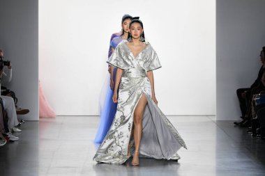 NEW YORK, NEW YORK - SEPTEMBER 05: Models walk the runway finale for Tadashi Shoji Spring/Summer 2020 during New York Fashion Week: The Shows at Gallery I at Spring Studios on September 05, 2019 in New York City. 
