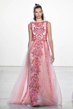 NEW YORK, NEW YORK - SEPTEMBER 05: A model walks the runway for Tadashi Shoji Spring/Summer 2020 during New York Fashion Week: The Shows at Gallery I at Spring Studios on September 05, 2019 in New York City. 