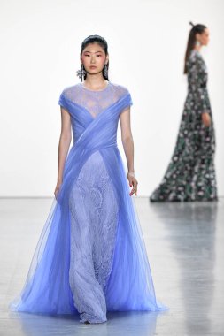 NEW YORK, NEW YORK - SEPTEMBER 05: A model walks the runway for Tadashi Shoji Spring/Summer 2020 during New York Fashion Week: The Shows at Gallery I at Spring Studios on September 05, 2019 in New York City. 