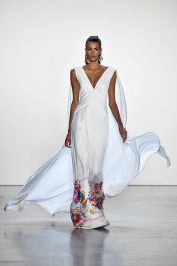 NEW YORK, NEW YORK - SEPTEMBER 05: A model walks the runway for Tadashi Shoji Spring/Summer 2020 during New York Fashion Week: The Shows at Gallery I at Spring Studios on September 05, 2019 in New York City. 