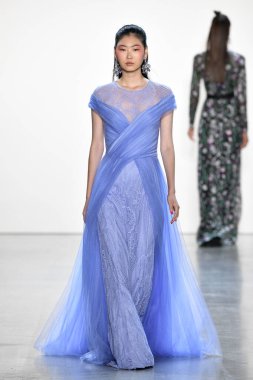 NEW YORK, NEW YORK - SEPTEMBER 05: A model walks the runway for Tadashi Shoji Spring/Summer 2020 during New York Fashion Week: The Shows at Gallery I at Spring Studios on September 05, 2019 in New York City. 