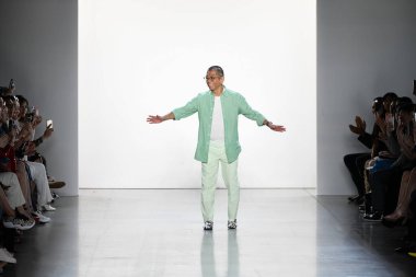 NEW YORK, NEW YORK - SEPTEMBER 05: Designer Tadashi Shoji greets the audience after presenting his collection Spring/Summer 2020 during New York Fashion Week: The Shows at Gallery I at Spring Studios on September 05, 2019 in New York City. 