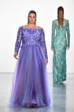 NEW YORK, NEW YORK - SEPTEMBER 05: A model walks the runway for Tadashi Shoji Spring/Summer 2020 during New York Fashion Week: The Shows at Gallery I at Spring Studios on September 05, 2019 in New York City. 