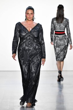 NEW YORK, NEW YORK - SEPTEMBER 05: A model walks the runway for Tadashi Shoji Spring/Summer 2020 during New York Fashion Week: The Shows at Gallery I at Spring Studios on September 05, 2019 in New York City. 