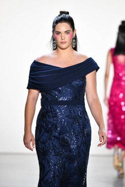 NEW YORK, NEW YORK - SEPTEMBER 05: A model walks the runway for Tadashi Shoji Spring/Summer 2020 during New York Fashion Week: The Shows at Gallery I at Spring Studios on September 05, 2019 in New York City. 