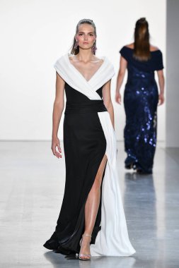 NEW YORK, NEW YORK - SEPTEMBER 05: A model walks the runway for Tadashi Shoji Spring/Summer 2020 during New York Fashion Week: The Shows at Gallery I at Spring Studios on September 05, 2019 in New York City. 