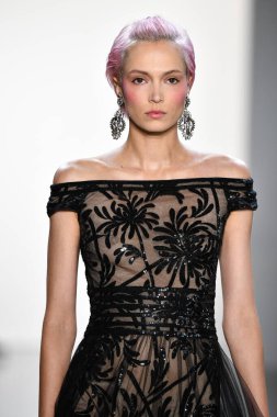 NEW YORK, NEW YORK - SEPTEMBER 05: A model walks the runway for Tadashi Shoji Spring/Summer 2020 during New York Fashion Week: The Shows at Gallery I at Spring Studios on September 05, 2019 in New York City. 