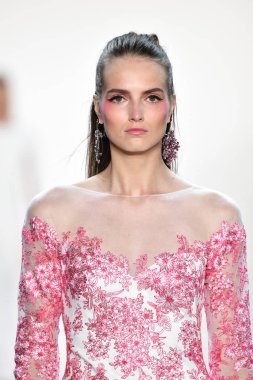 NEW YORK, NEW YORK - SEPTEMBER 05: A model walks the runway for Tadashi Shoji Spring/Summer 2020 during New York Fashion Week: The Shows at Gallery I at Spring Studios on September 05, 2019 in New York City. 