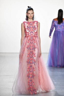NEW YORK, NEW YORK - SEPTEMBER 05: A model walks the runway for Tadashi Shoji Spring/Summer 2020 during New York Fashion Week: The Shows at Gallery I at Spring Studios on September 05, 2019 in New York City. 
