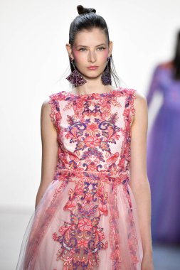 NEW YORK, NEW YORK - SEPTEMBER 05: A model walks the runway for Tadashi Shoji Spring/Summer 2020 during New York Fashion Week: The Shows at Gallery I at Spring Studios on September 05, 2019 in New York City. 