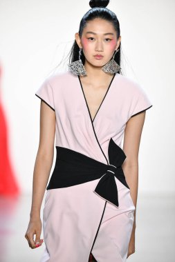 NEW YORK, NEW YORK - SEPTEMBER 05: A model walks the runway for Tadashi Shoji Spring/Summer 2020 during New York Fashion Week: The Shows at Gallery I at Spring Studios on September 05, 2019 in New York City. 