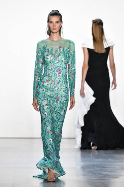 NEW YORK, NEW YORK - SEPTEMBER 05: A model walks the runway for Tadashi Shoji Spring/Summer 2020 during New York Fashion Week: The Shows at Gallery I at Spring Studios on September 05, 2019 in New York City. 