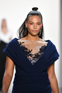 NEW YORK, NEW YORK - SEPTEMBER 05: A model walks the runway for Tadashi Shoji Spring/Summer 2020 during New York Fashion Week: The Shows at Gallery I at Spring Studios on September 05, 2019 in New York City. 