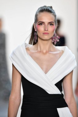 NEW YORK, NEW YORK - SEPTEMBER 05: A model walks the runway for Tadashi Shoji Spring/Summer 2020 during New York Fashion Week: The Shows at Gallery I at Spring Studios on September 05, 2019 in New York City. 