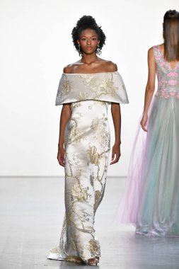 NEW YORK, NEW YORK - SEPTEMBER 05: A model walks the runway for Tadashi Shoji Spring/Summer 2020 during New York Fashion Week: The Shows at Gallery I at Spring Studios on September 05, 2019 in New York City. 