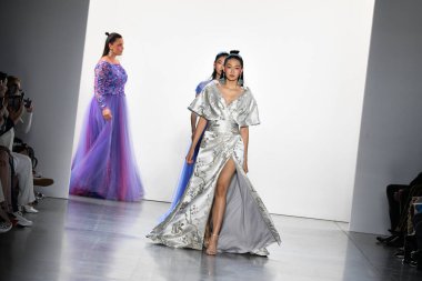 NEW YORK, NEW YORK - SEPTEMBER 05: Models walk the runway finale for Tadashi Shoji Spring/Summer 2020 during New York Fashion Week: The Shows at Gallery I at Spring Studios on September 05, 2019 in New York City. 