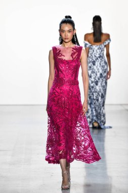NEW YORK, NEW YORK - SEPTEMBER 05: A model walks the runway for Tadashi Shoji Spring/Summer 2020 during New York Fashion Week: The Shows at Gallery I at Spring Studios on September 05, 2019 in New York City. 