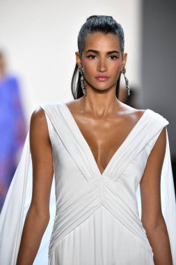 NEW YORK, NEW YORK - SEPTEMBER 05: A model walks the runway for Tadashi Shoji Spring/Summer 2020 during New York Fashion Week: The Shows at Gallery I at Spring Studios on September 05, 2019 in New York City. 