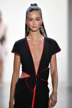 NEW YORK, NEW YORK - SEPTEMBER 05: A model walks the runway for Tadashi Shoji Spring/Summer 2020 during New York Fashion Week: The Shows at Gallery I at Spring Studios on September 05, 2019 in New York City. 
