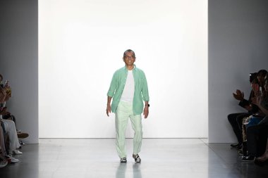 NEW YORK, NEW YORK - SEPTEMBER 05: Designer Tadashi Shoji greets the audience after presenting his collection Spring/Summer 2020 during New York Fashion Week: The Shows at Gallery I at Spring Studios on September 05, 2019 in New York City. 