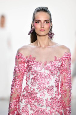NEW YORK, NEW YORK - SEPTEMBER 05: A model walks the runway for Tadashi Shoji Spring/Summer 2020 during New York Fashion Week: The Shows at Gallery I at Spring Studios on September 05, 2019 in New York City. 
