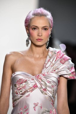 NEW YORK, NEW YORK - SEPTEMBER 05: A model walks the runway for Tadashi Shoji Spring/Summer 2020 during New York Fashion Week: The Shows at Gallery I at Spring Studios on September 05, 2019 in New York City. 