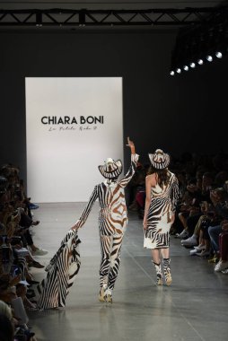 NEW YORK, NEW YORK - SEPTEMBER 07: Pat Cleveland and Anna Cleveland walk the runway for Chiara Boni during New York Fashion Week: The Shows at Gallery II at Spring Studios on September 07, 2019 in New York City. clipart