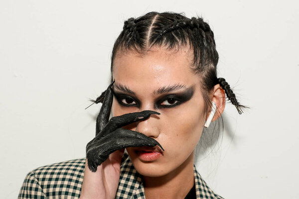 NEW YORK, NEW YORK - SEPTEMBER 10: A model posing backstage during Kaimin Ready to Wear Spring/Summer 2020 fashion show during New York Fashion Week on September 10, 2019 in New York City.