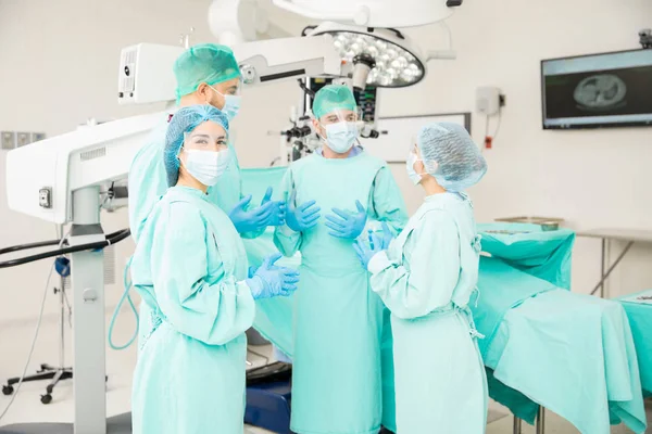 Female surgeon gathered with her team — Stock Photo, Image