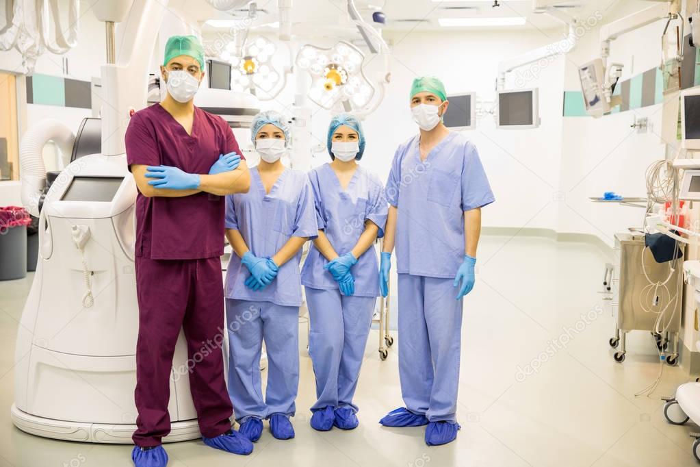 four doctors ready for surgery