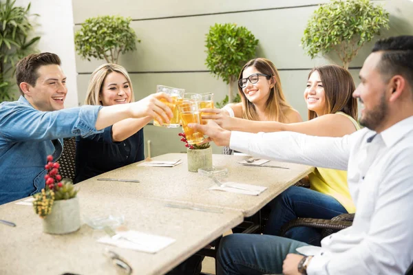 Friends making a toast with beer — Stock Photo, Image