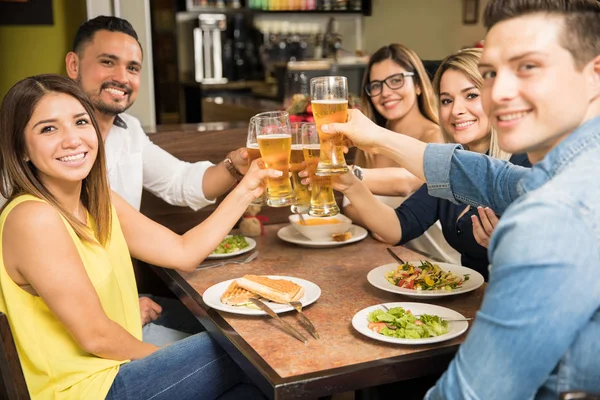 Five friends making a toast with beer — Stock Photo, Image