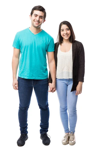 Beautiful couple holding hands — Stock Photo, Image