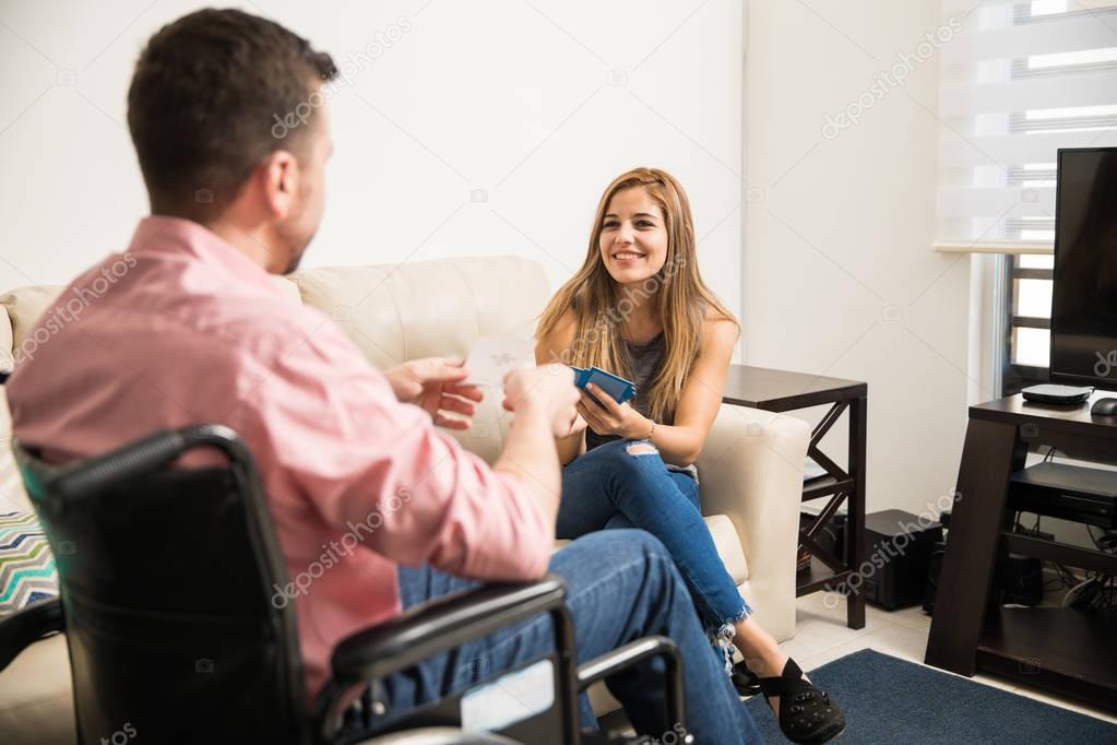 Woman dating man in a wheelchair