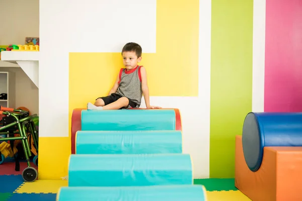 Little boy in an obstacle course — Stock Photo, Image