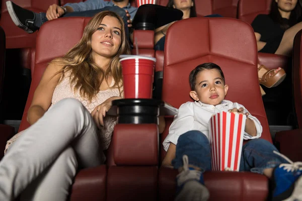 Little boy and mother at cinema — Stock Photo, Image