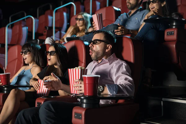 Surprised crowd watching 3d movie — Stock Photo, Image