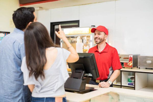 Couple picking snacks in concession stand