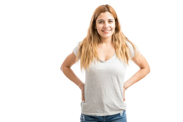 Woman with arms on waist — Stock Photo, Image