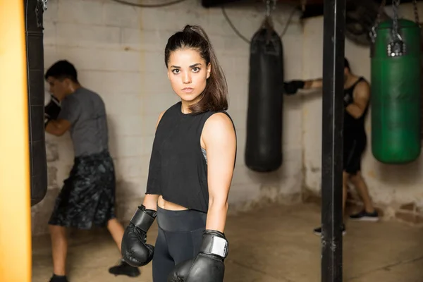 Female boxer in a boxing gym