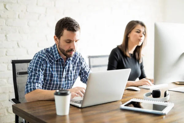 Business partners focused on a project — Stock Photo, Image