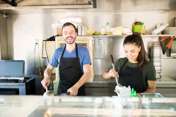 Handsome chef in a food truck — Stock Photo, Image