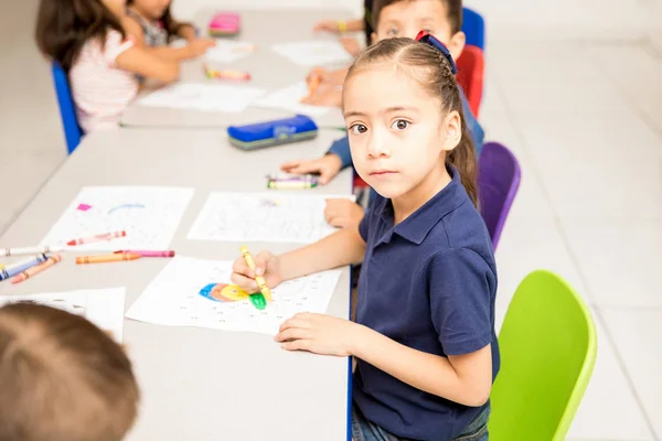 Pretty Preschool Latin Girl Doing Coloring Activity Crayons Classroom Making — Stock Photo, Image