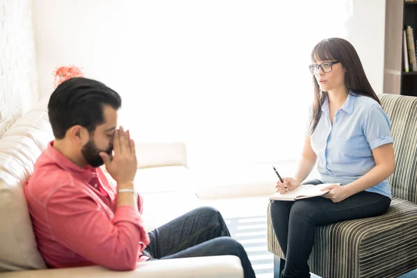 Young psychologist helping patient — Stock Photo, Image