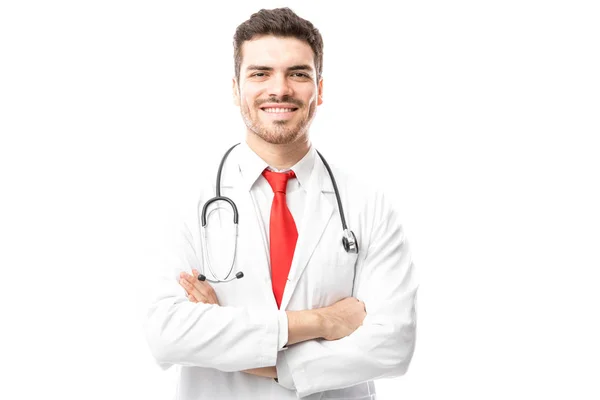 Attractive young doctor with arms crossed — Stock Photo, Image