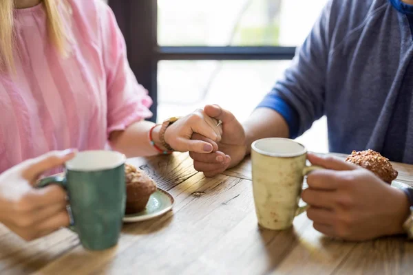 Closeup Young Couple Date Holding Hands While Having Coffee Cafe — Stock Photo, Image
