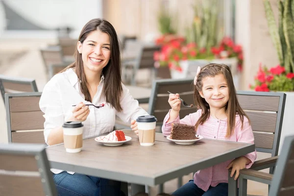 Mother Daughter Eating Cakes Cafe Blurred Background — Stock Photo, Image